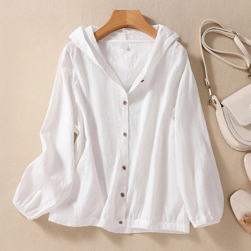 Chemise à capuche décontractée, silhouette fluide et élégante. 0
