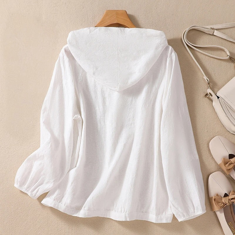 Chemise à capuche décontractée, silhouette fluide et élégante. 2