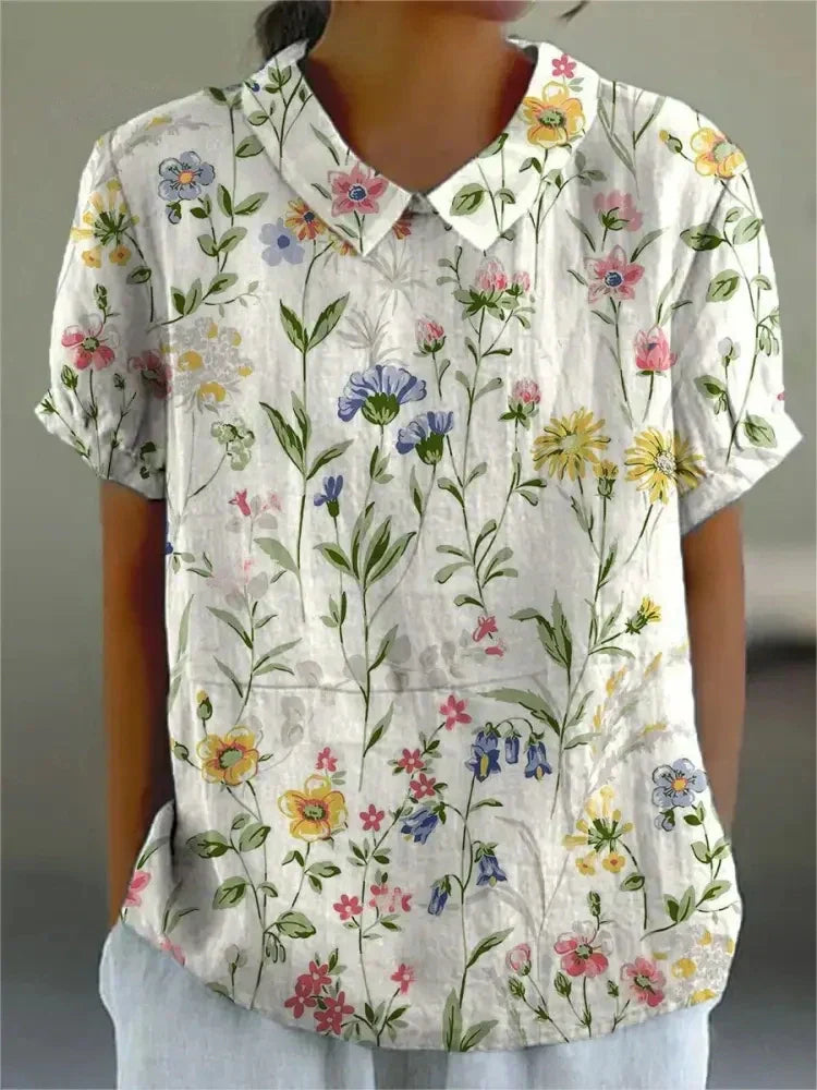 Chemise femme à design floral décontracté et coupe fluide. 1