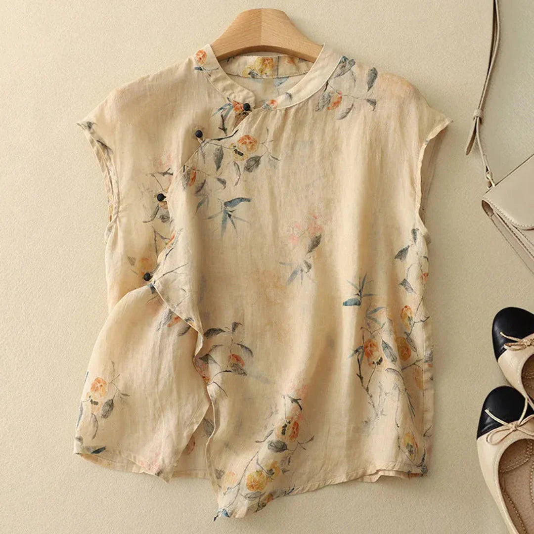 Chemisier femme chic, col chinois, sans manches, silhouette fluide. - 1