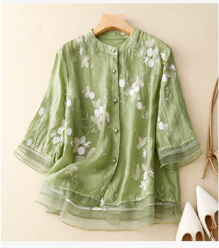 Chemisier femme chic, broderie florale délicate, coupe fluide. 0
