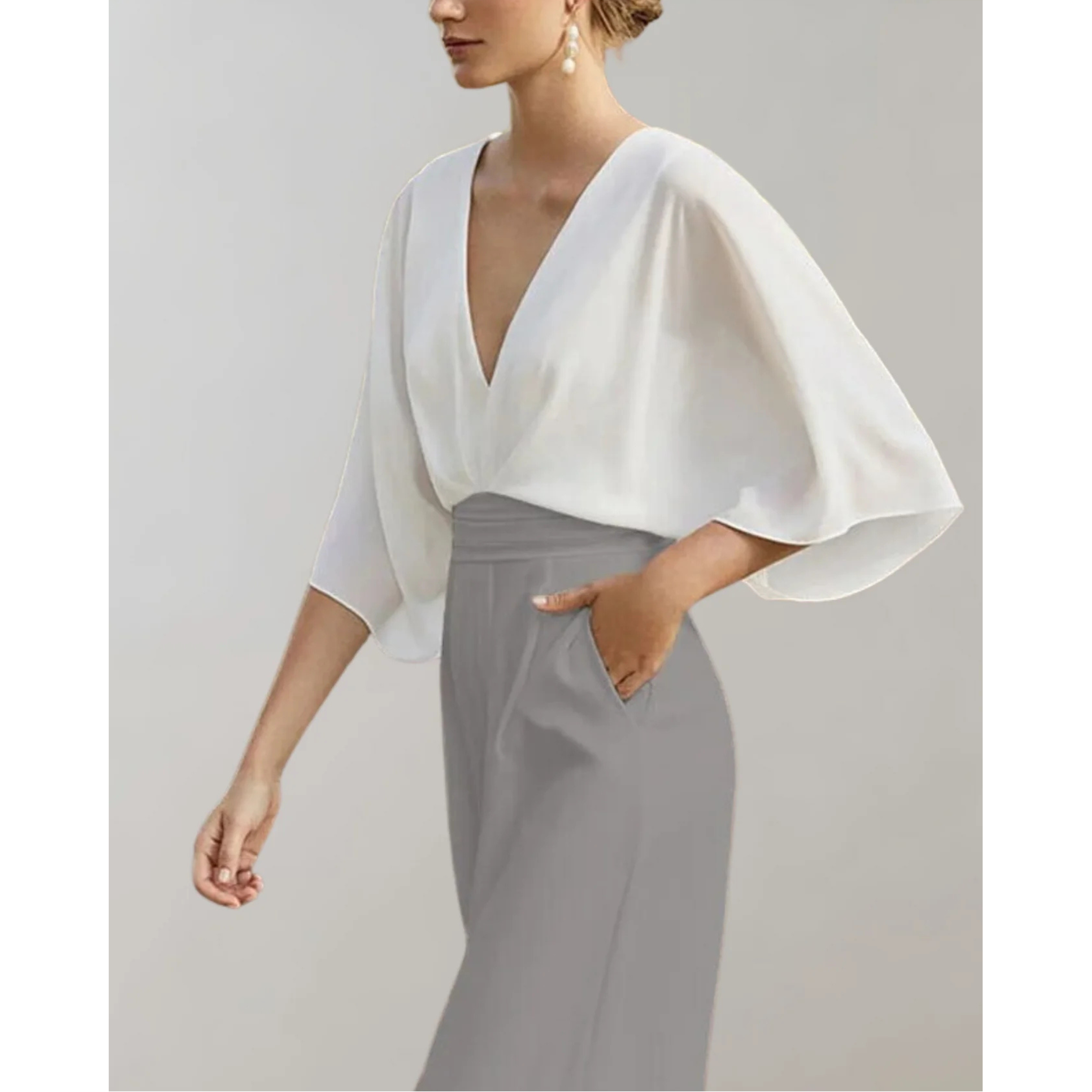 Combinaison femme chic, ajustée avec décolleté en V, sans manches, fluide. - 9