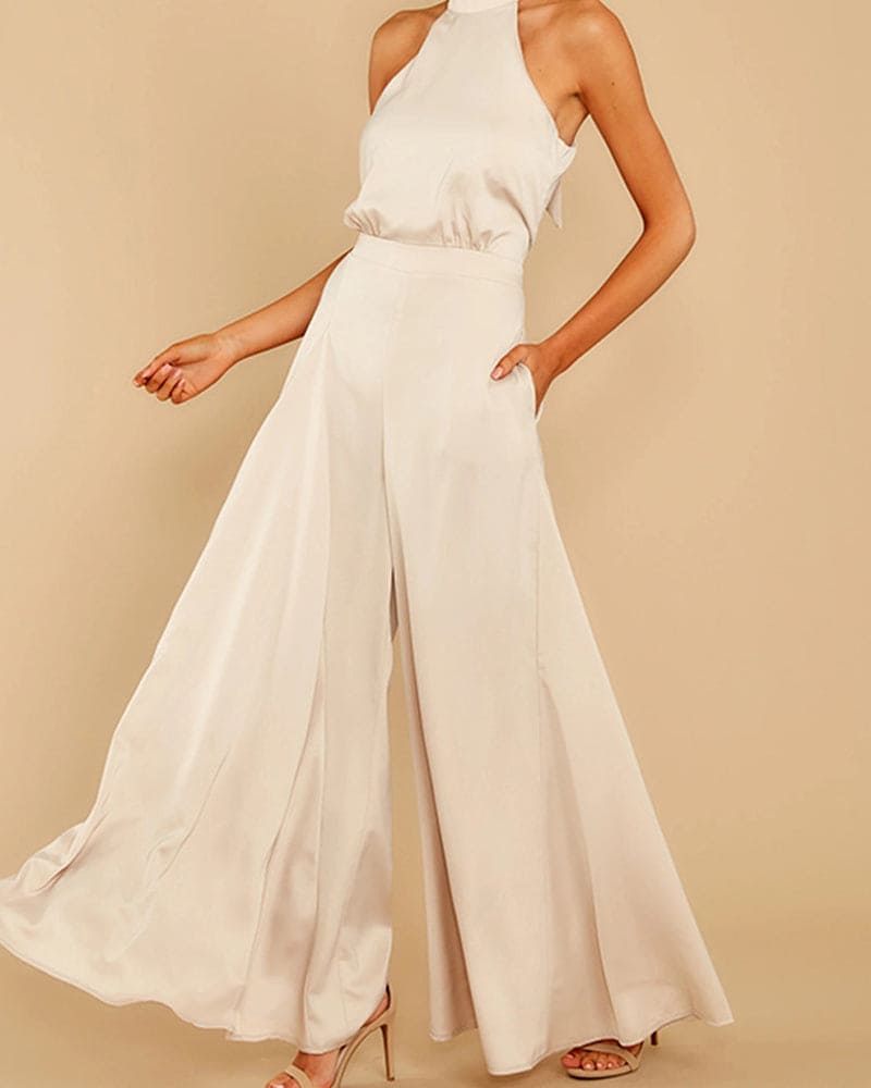 Combinaison femme chic, évasée avec jambes larges et design moderne. - 4