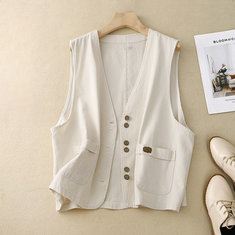 Gilet femme élégant sans manches à coupe fluide. 0