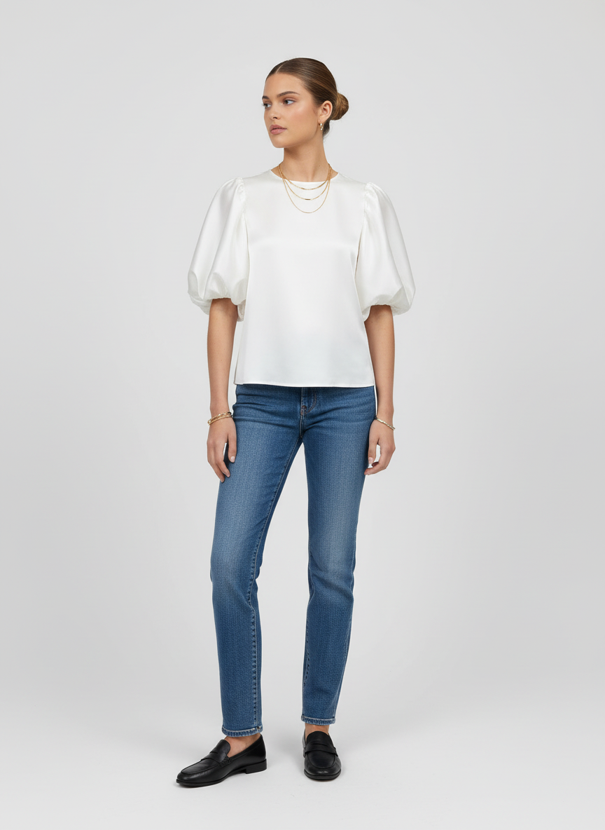 Haut femme à manches bouffantes, silhouette cintrée et style décontracté. - 1