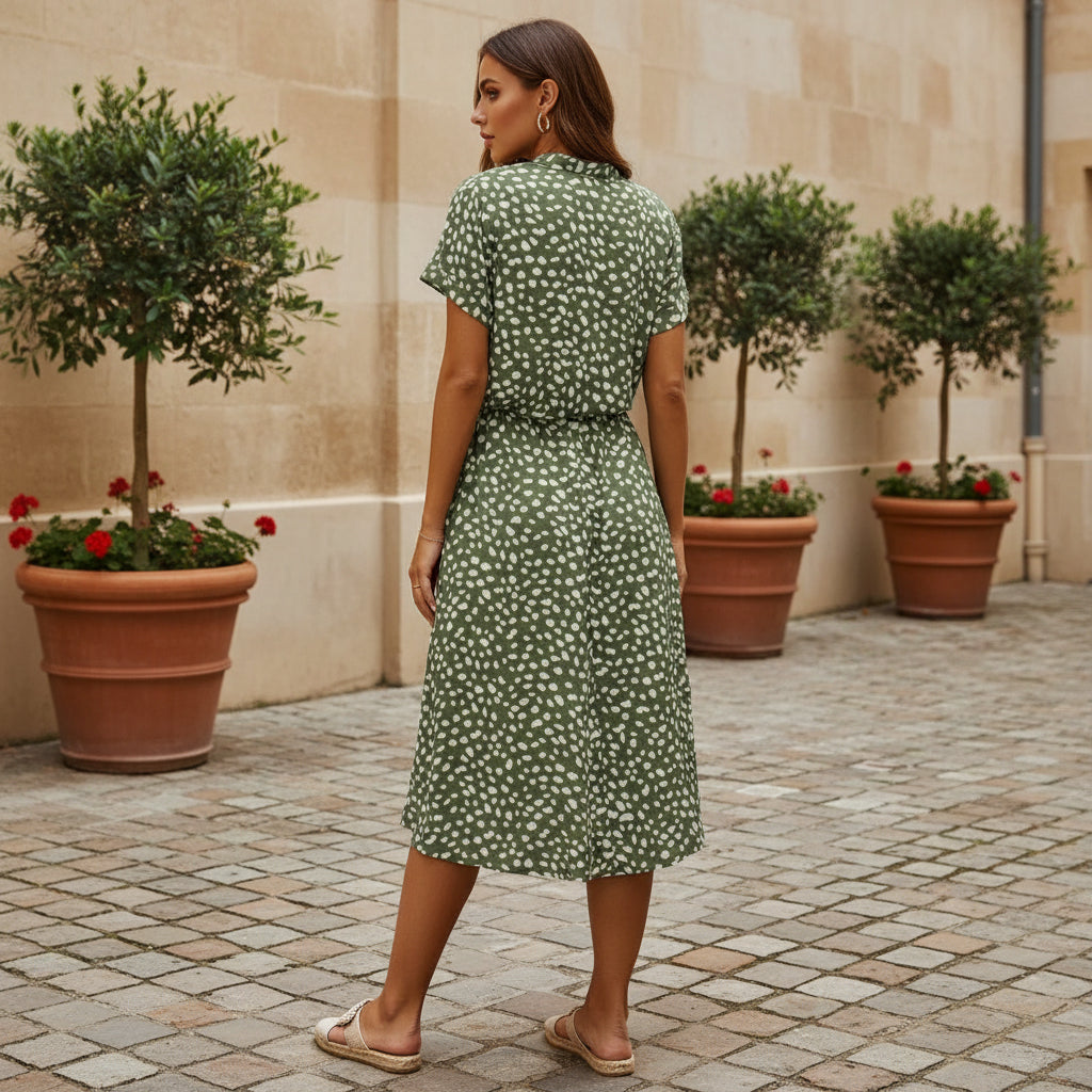 Robe midi élégante à design fluide et imprimé. - 4