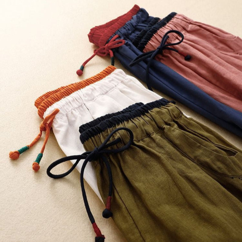 Pantalon d'été femme, coupe ample et fluide, idéal pour les journées décontractées. 1