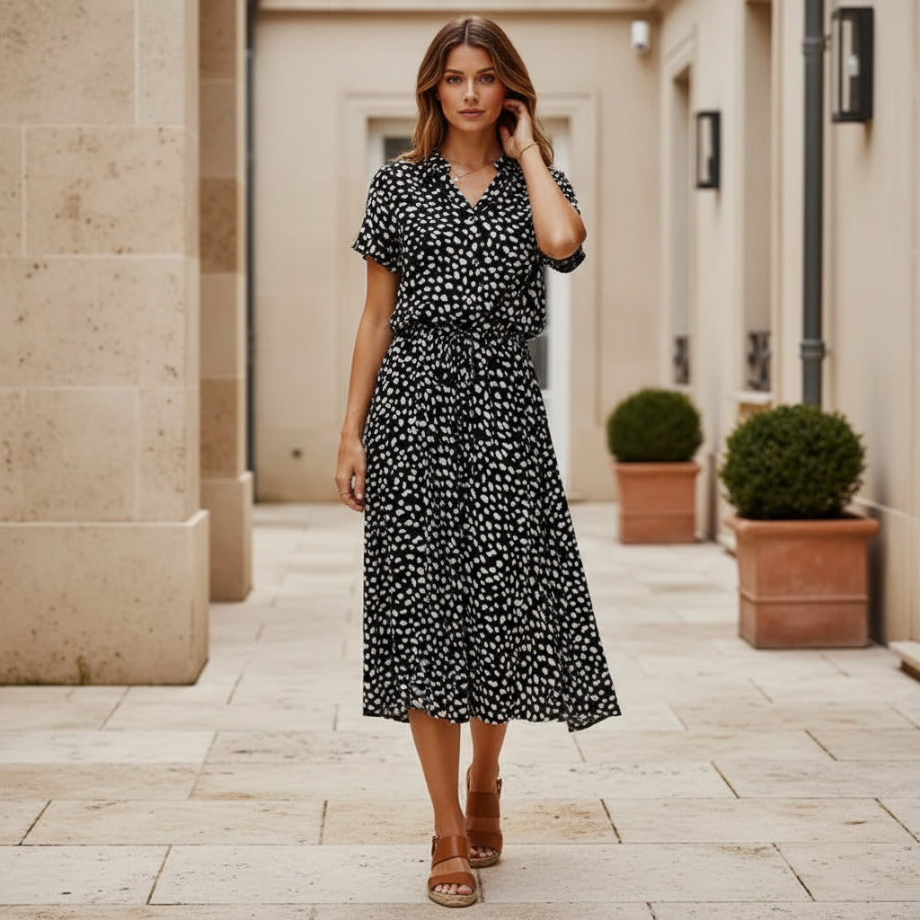 Robe midi élégante à design fluide et imprimé. - 8