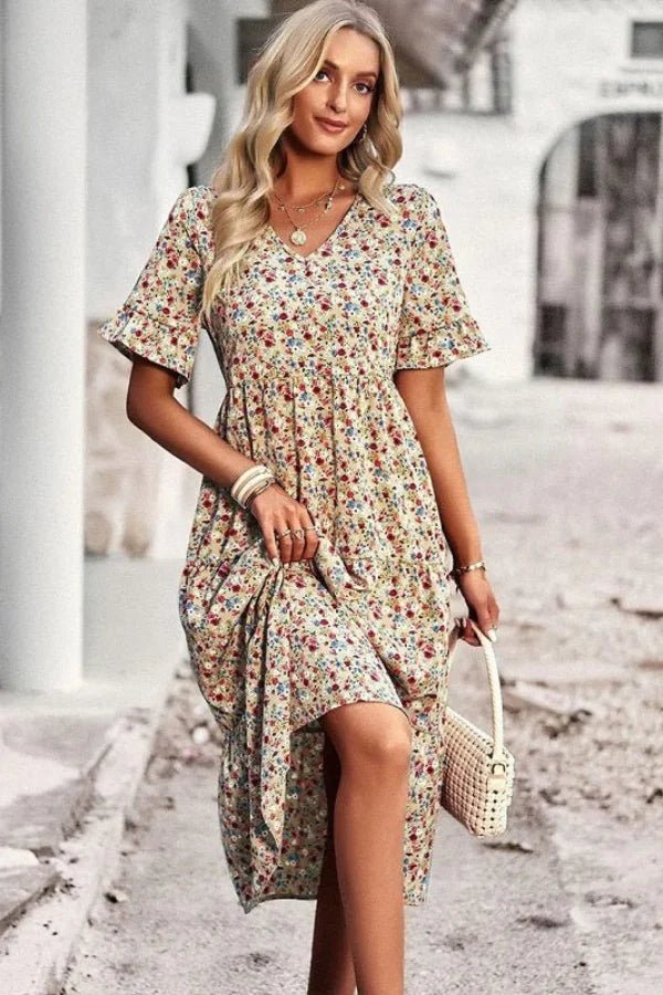 Robe d'été femme à imprimé floral, silhouette mi-longue et style chic. 7