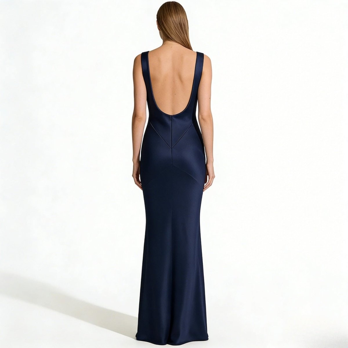 Elegant backless dress with a sculpted silhouette for evening occasions. 7
