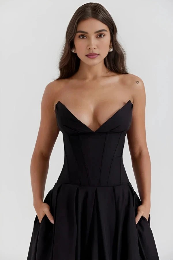 Robe évasée avec corsage sculpté, idéale pour les occasions formelles. 3