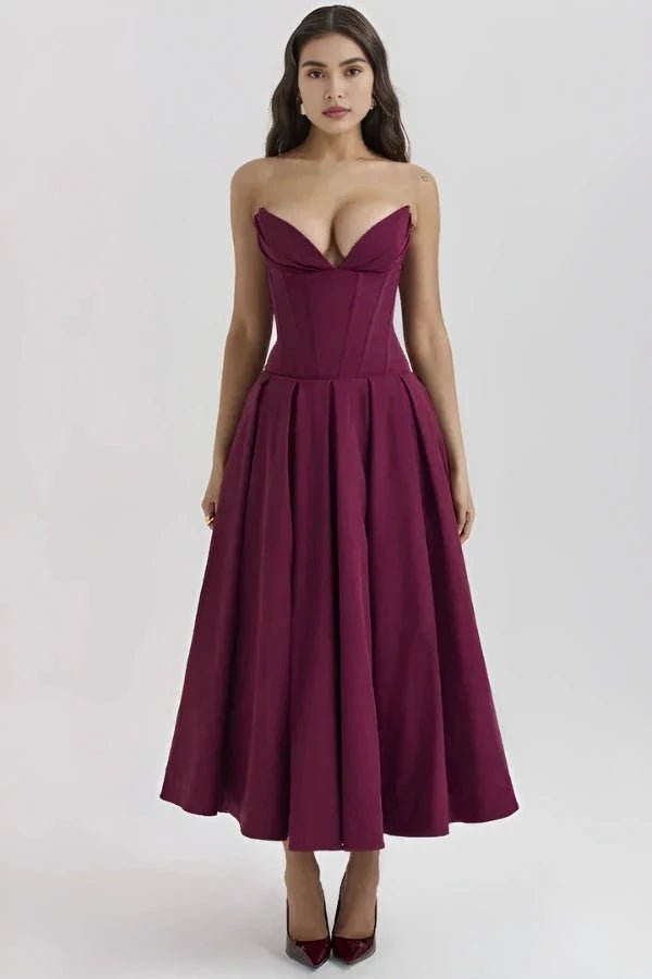 Robe évasée avec corsage sculpté, idéale pour les occasions formelles. 7