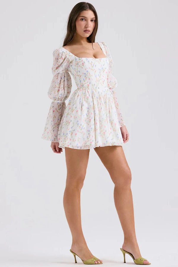 Robe évasée avec manches légères et imprimé floral. 0