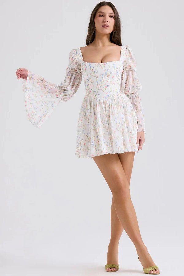 Robe évasée avec manches légères et imprimé floral. 3