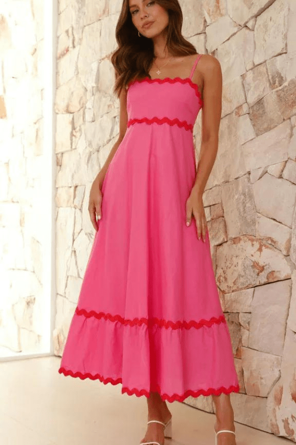 Robe longue élégante à bretelles réglables et silhouette fluide. 4