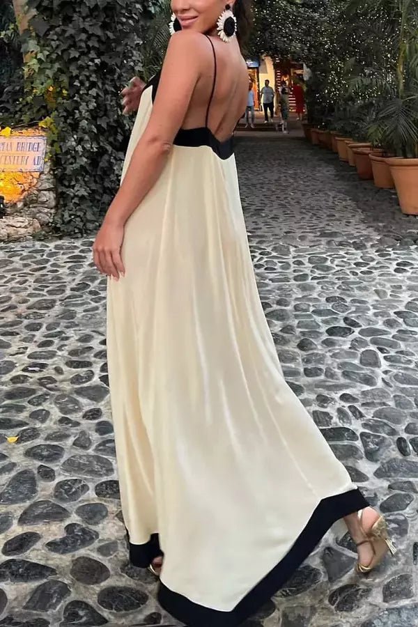 Robe longue élégante, silhouette sculptée et design moderne. 3