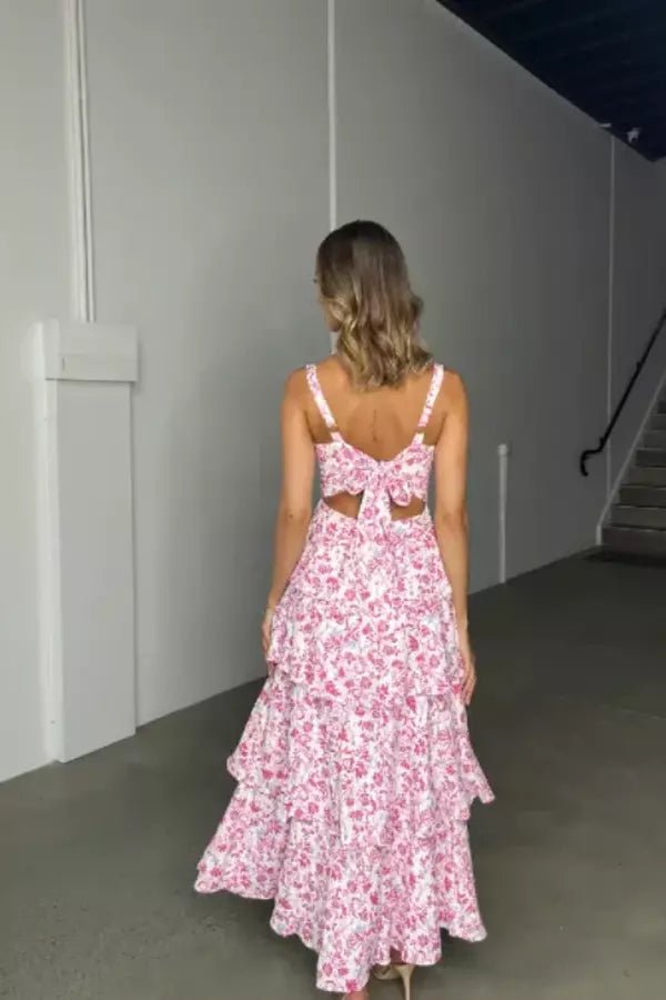 Robe longue évasée avec encolure élastique et jupe à volants. 4