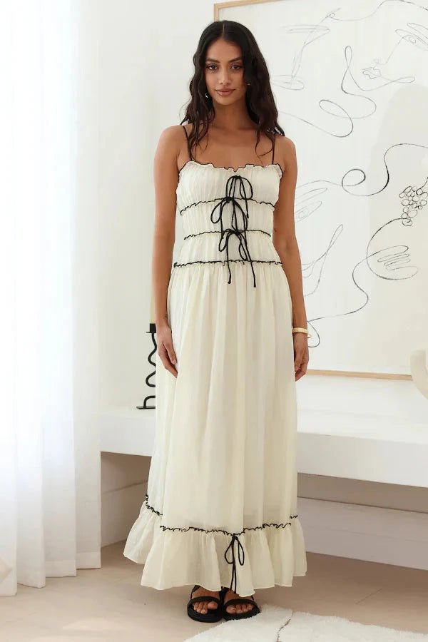 Robe longue élégante à jupes fluides et volants, idéale pour les soirées. - 7
