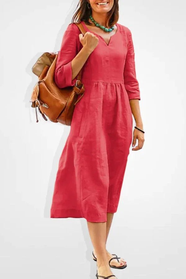 Robe longue fluide à manches longues élégantes. 1