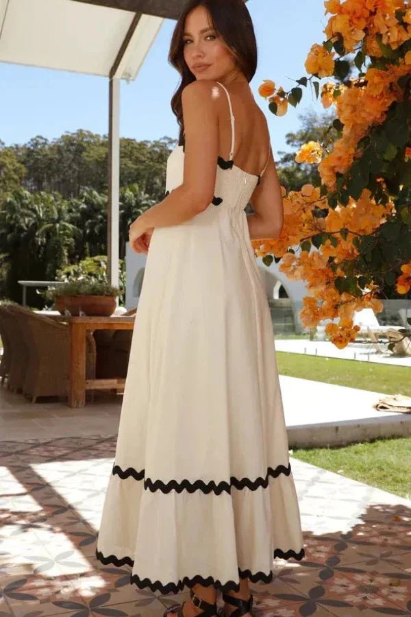 Robe midi élégante avec encolure en V et bordure contrastante, idéale pour des occasions formelles. - 2