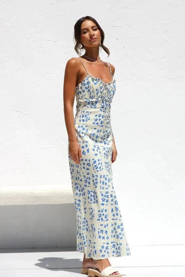 Robe midi élégante, silhouette droite avec volants et motifs floraux. 5