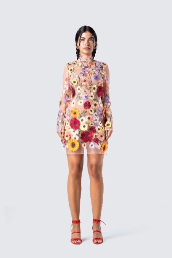 Robe mini élégante à dos nu avec appliques florales. 1