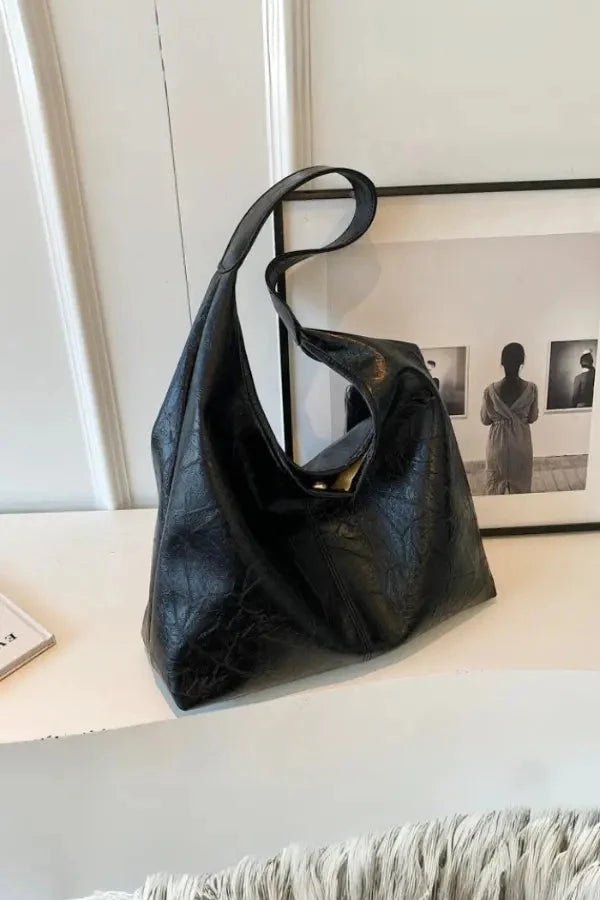 Sac à main élégant pour femme avec design moderne et poche pratique. - 2