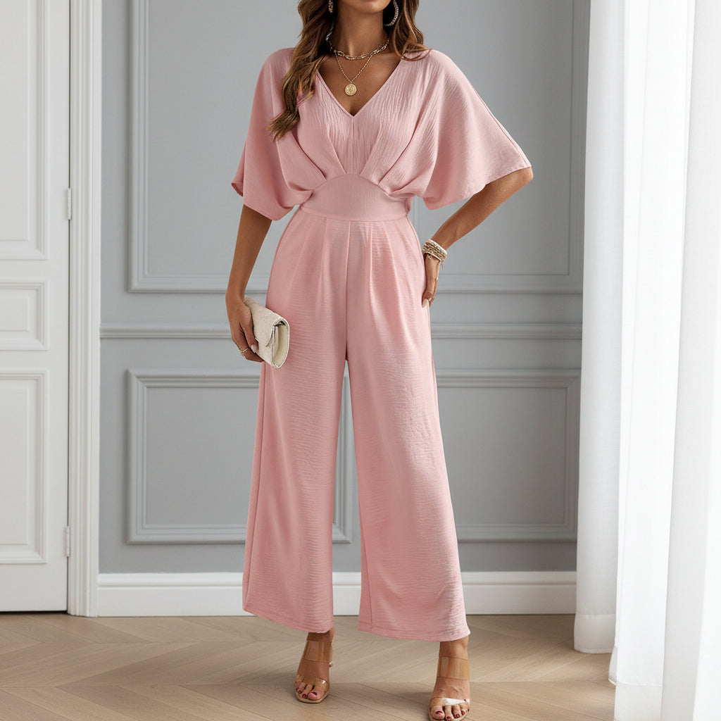 Combinaison femme à décolleté en V et pantalon évasé. - 5