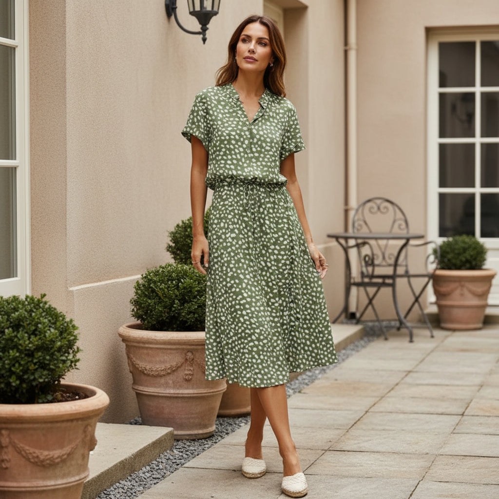 Robe midi élégante à design fluide et imprimé. - 3