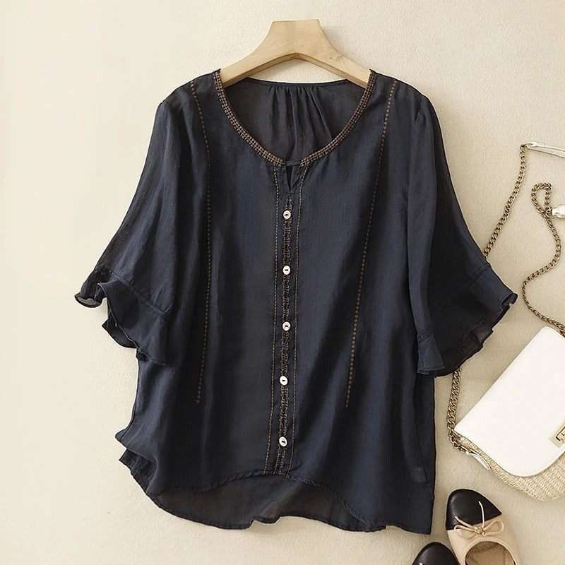 Blouse élégante à manches volantées, parfaite pour des occasions formelles. 3