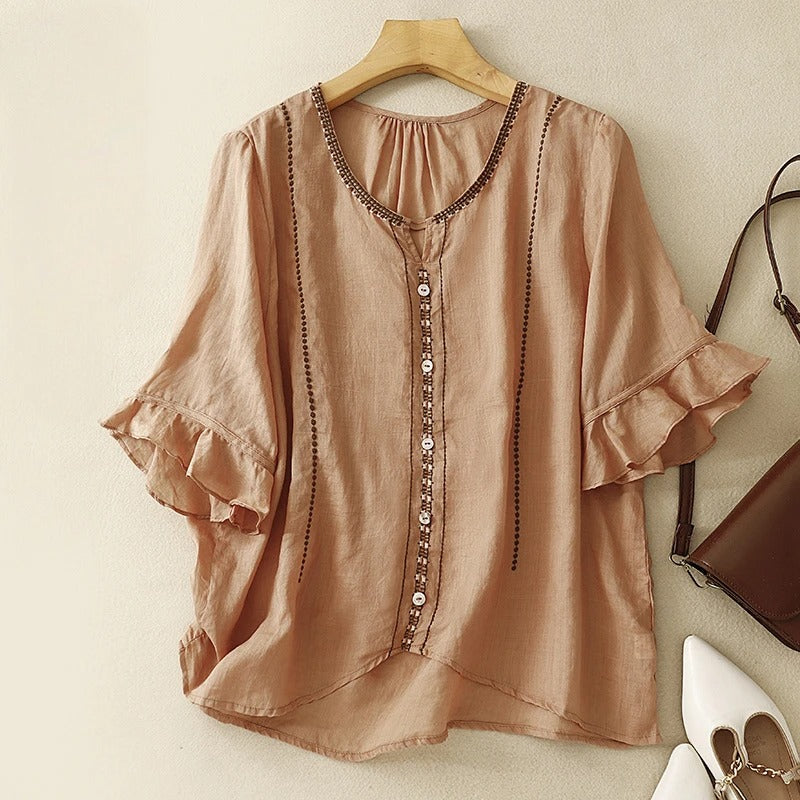 Blouse élégante à manches volantées, parfaite pour des occasions formelles. 4