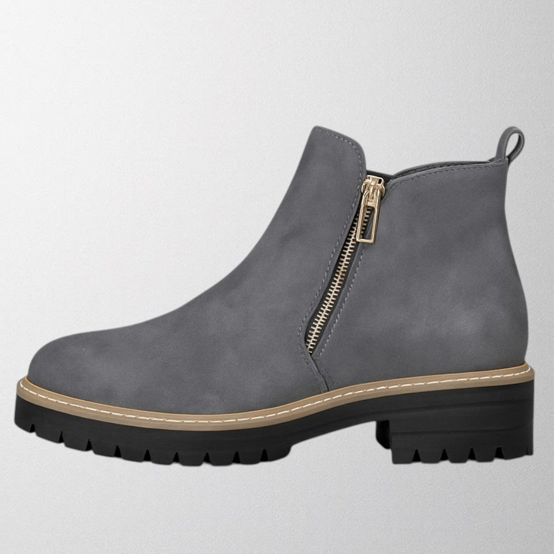 Chaussures femme élégantes à bout rond avec fermeture zippée latérale. 1