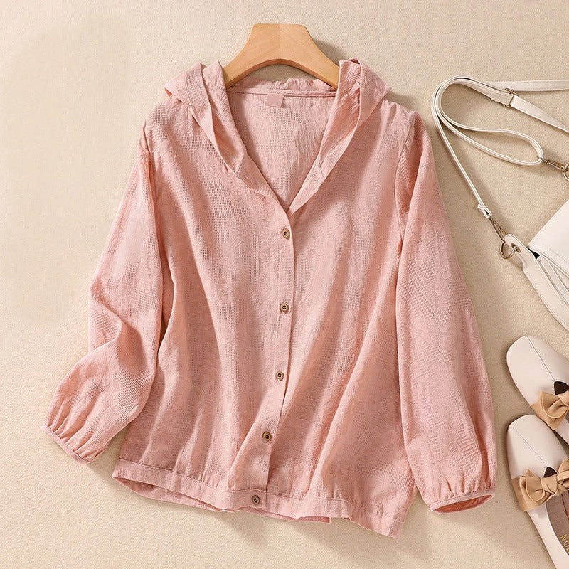 Chemise à capuche décontractée, silhouette fluide et élégante. 4