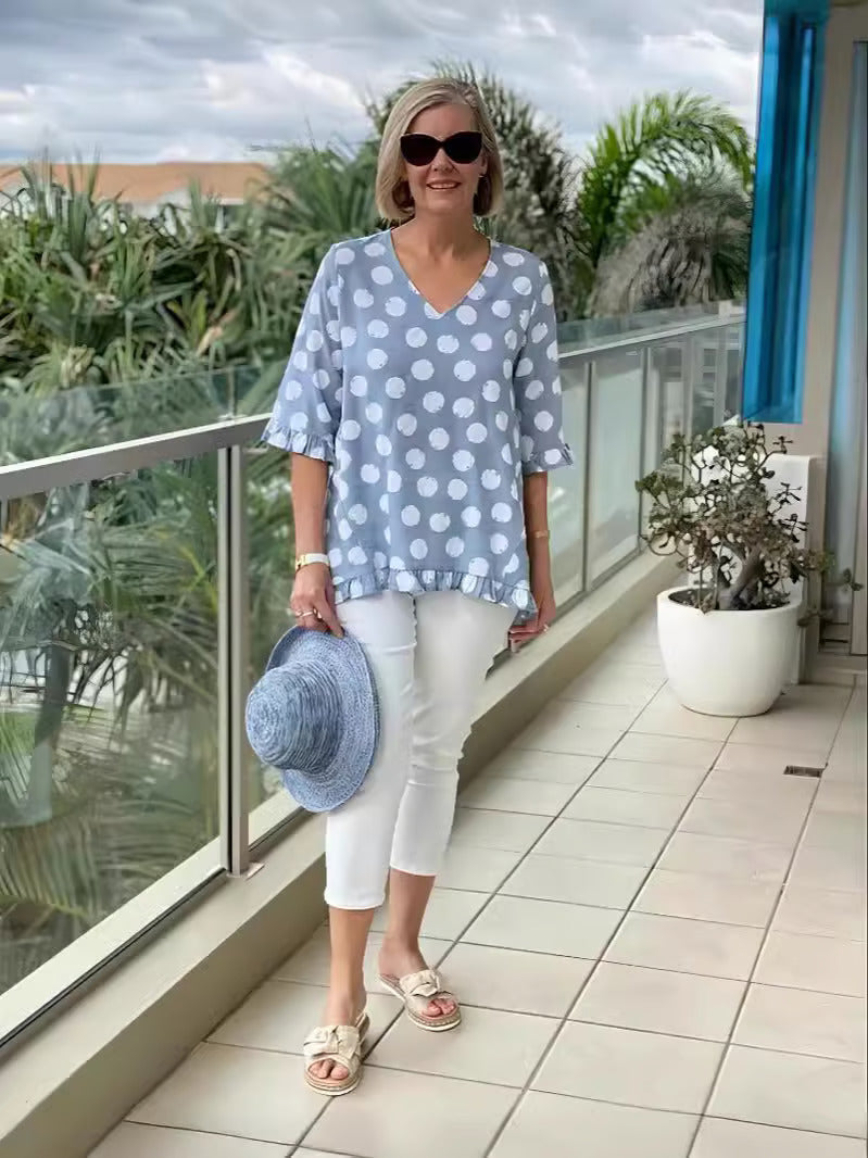 Chemisier femme chic, silhouette fluide, col en V et motif à pois. 0