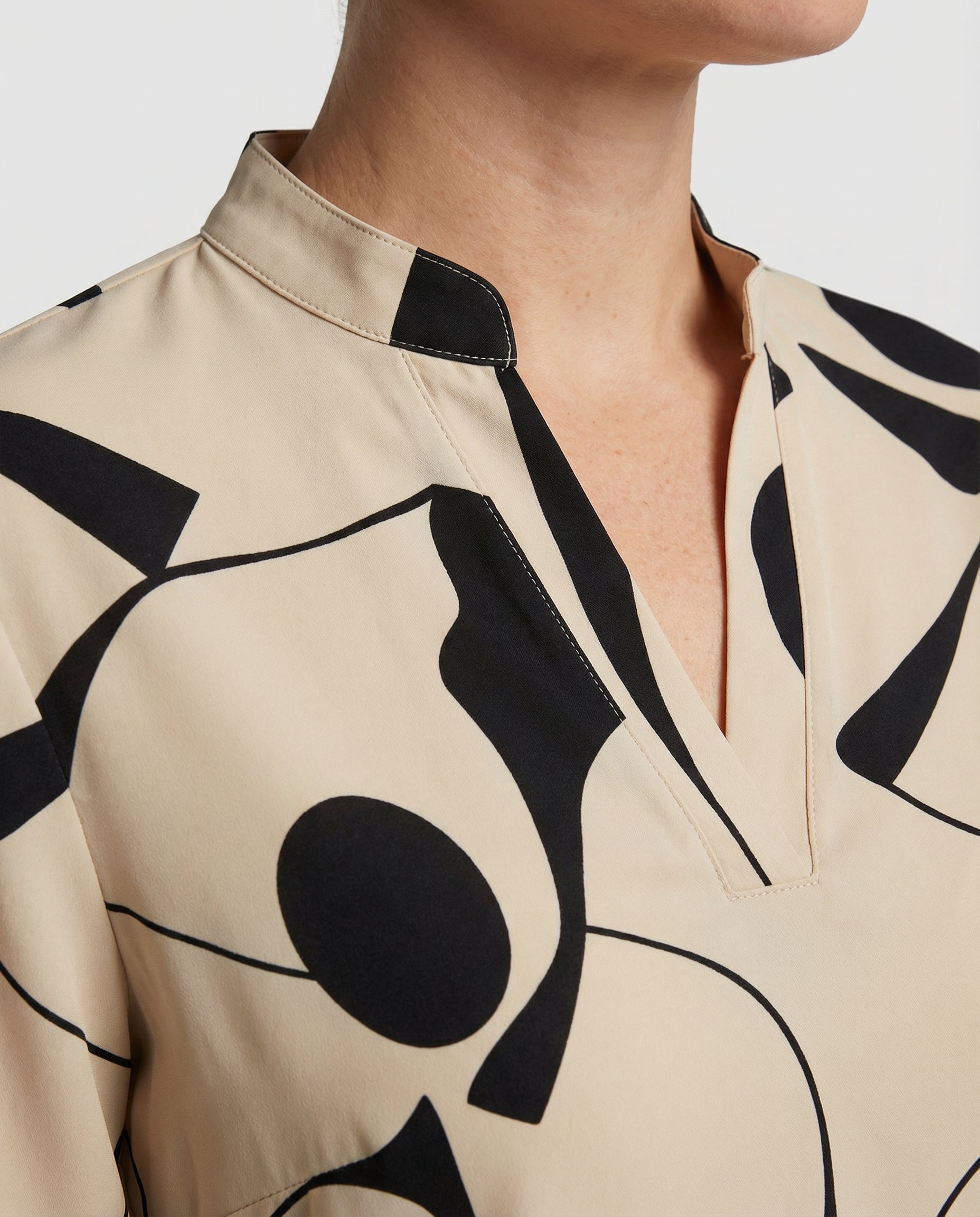Chemisier femme chic, coupe confortable, manches longues, design moderne. - 5