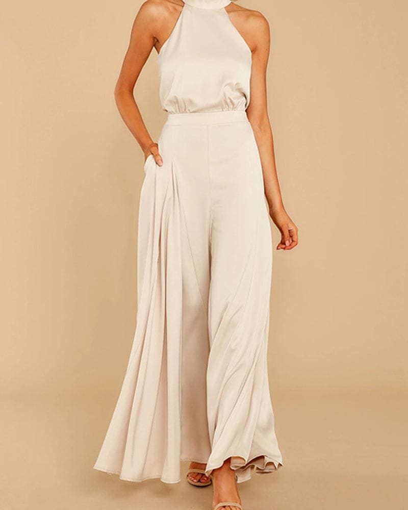 Combinaison femme chic, évasée avec jambes larges et design moderne. - 1