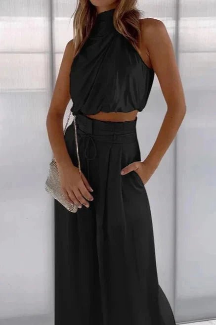 Ensemble d'été chic avec un haut sans manches et un pantalon large. 0