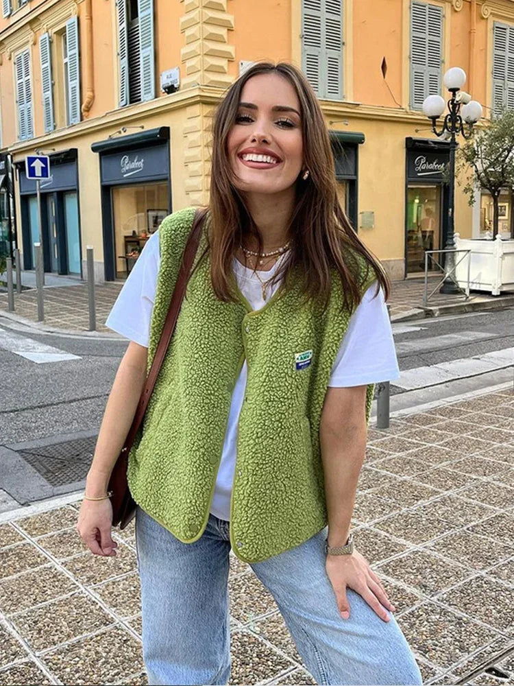 Gilet élégant sans manches avec col en V et boutons. - 4