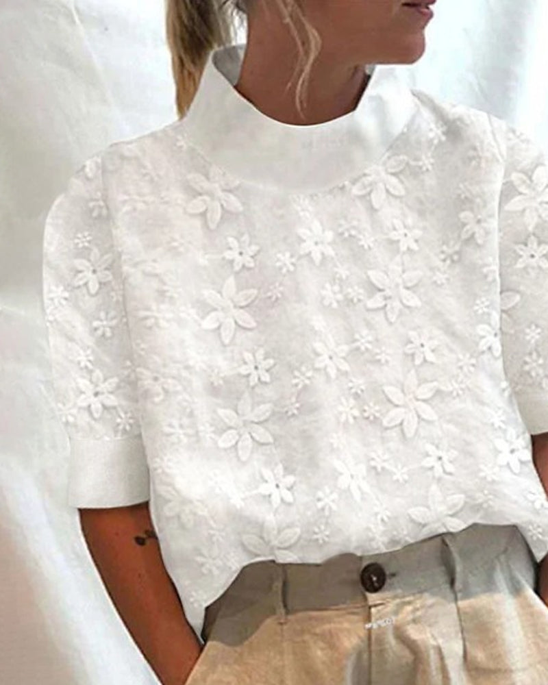 Haut élégant à col montant avec motif floral chic. 0