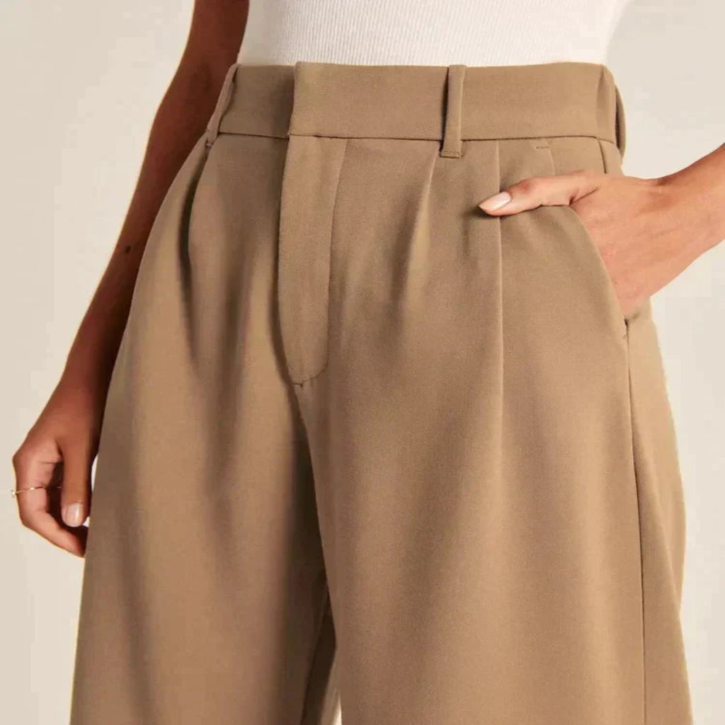 Pantalon fluide femme à large jambe, style décontracté et chic. - 8