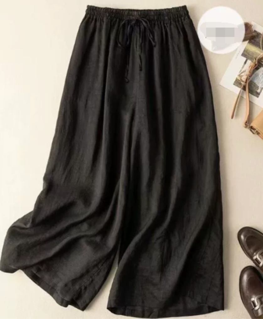 Pantalon décontracté femme, jambe large fluide et taille froncée. 0