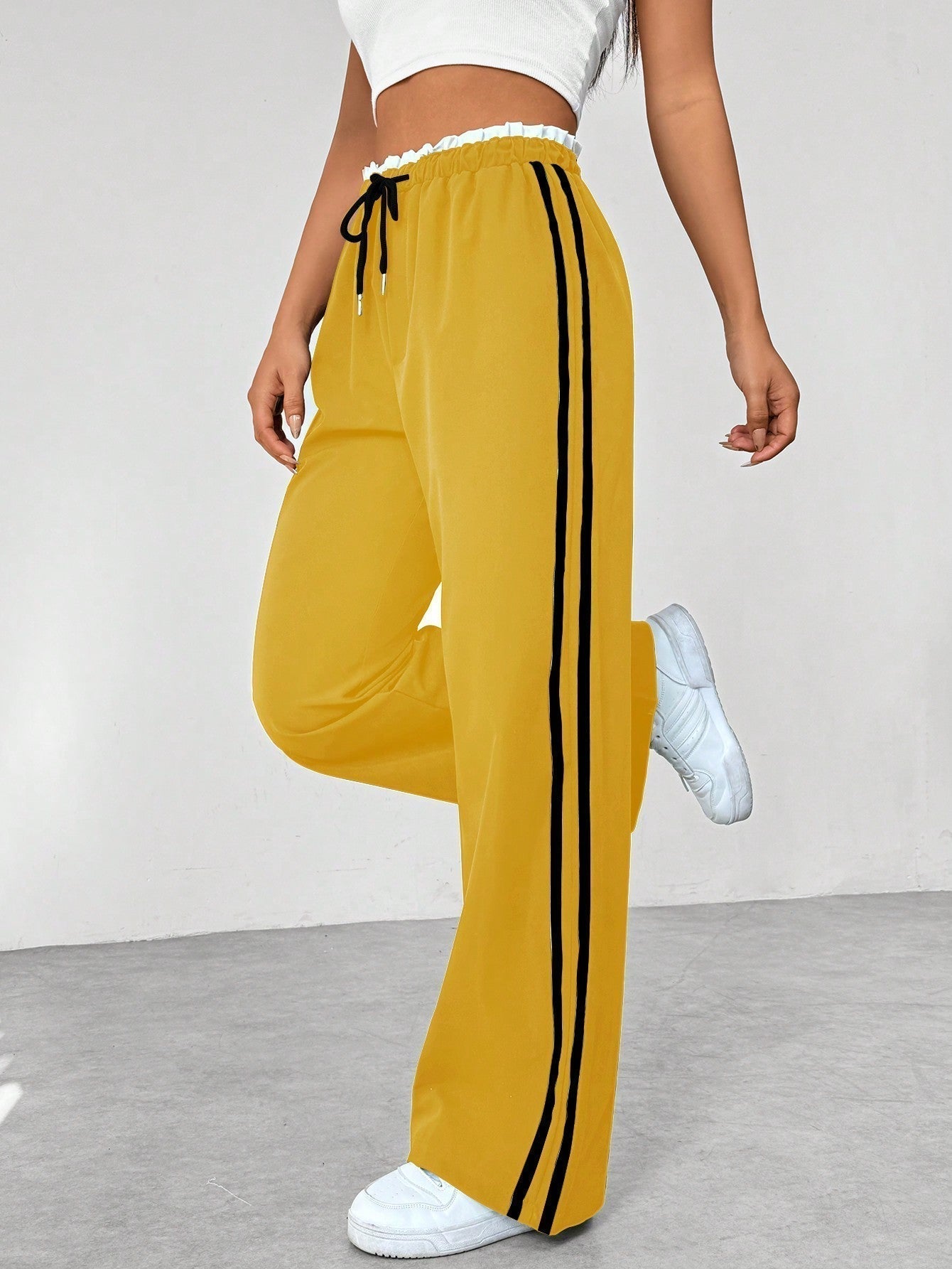 Pantalon large femme, coupe fluide, style moderne avec rayures. - 6