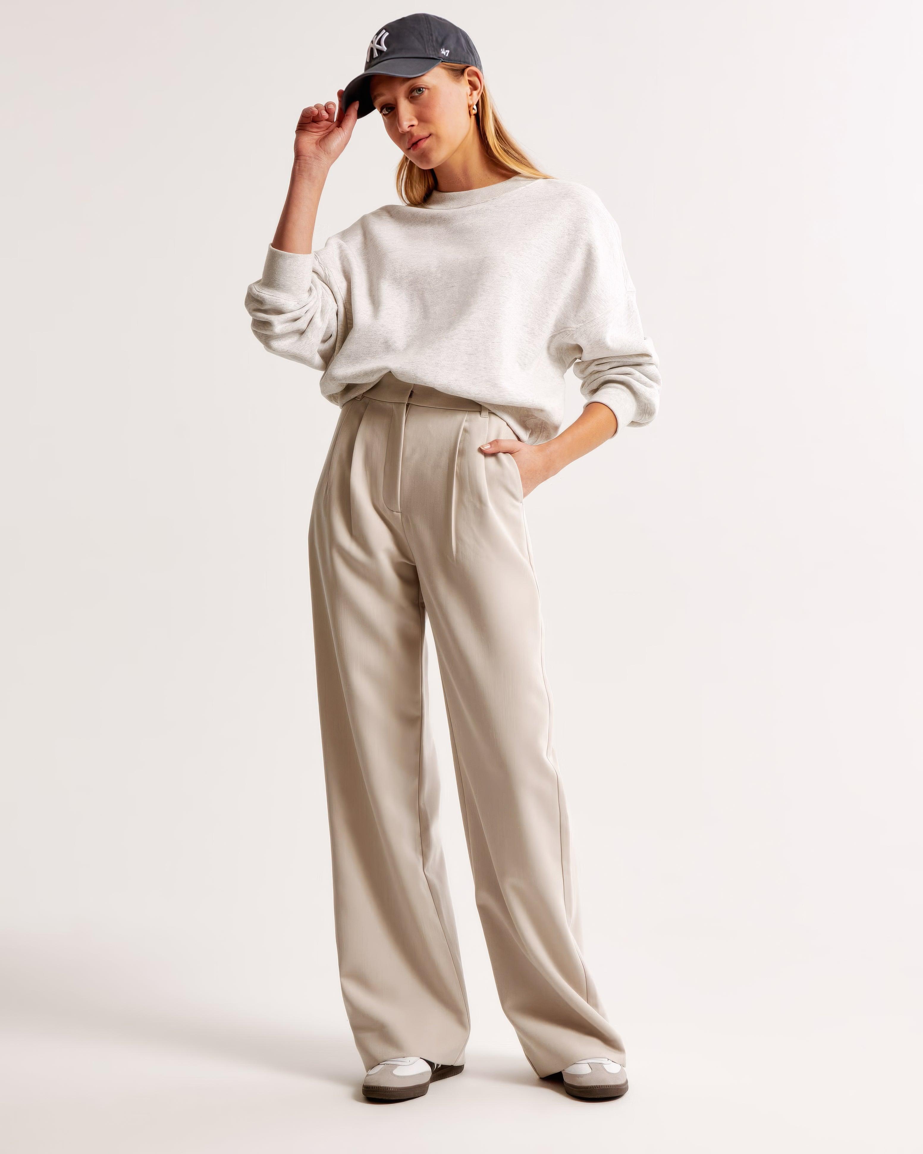 Pantalon femme plissé, coupe fuselée élégante. - 1