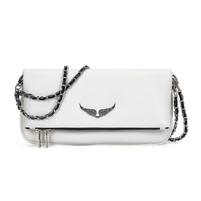 Pochette élégante au design intemporel avec fermeture zip. - 3