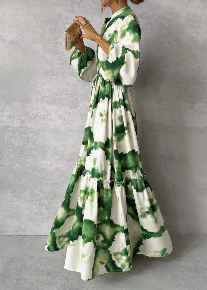 Robe longue fluide avec col en V élégant et manches longues. - 3
