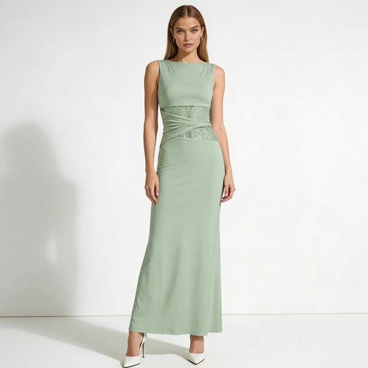 Elegant column dress with an asymmetrical wrap and refined lace detailing. 0