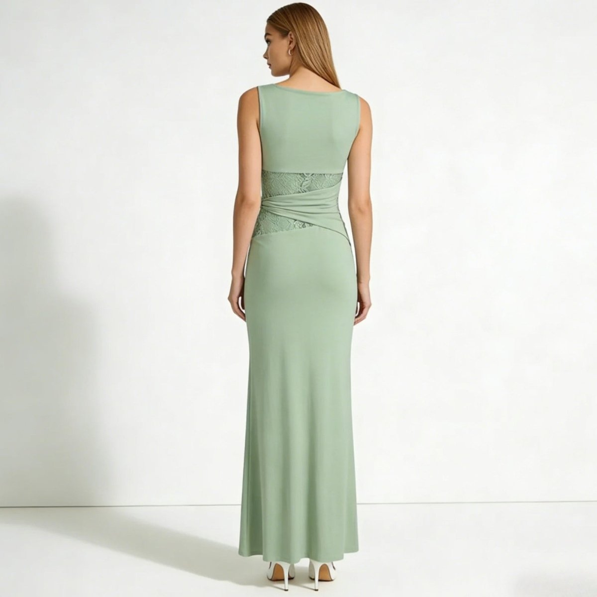 Elegant column dress with an asymmetrical wrap and refined lace detailing. 2