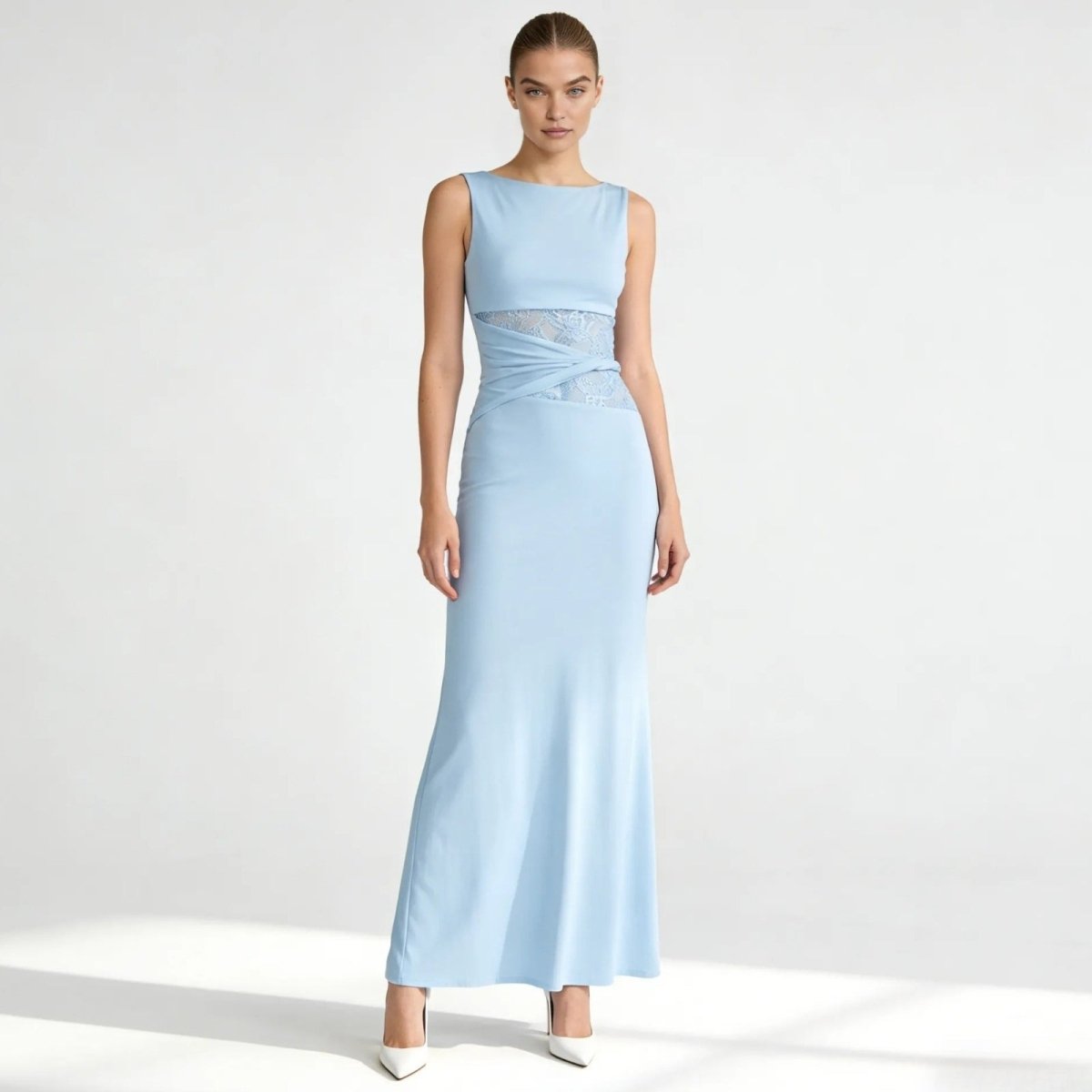 Elegant column dress with an asymmetrical wrap and refined lace detailing. 5