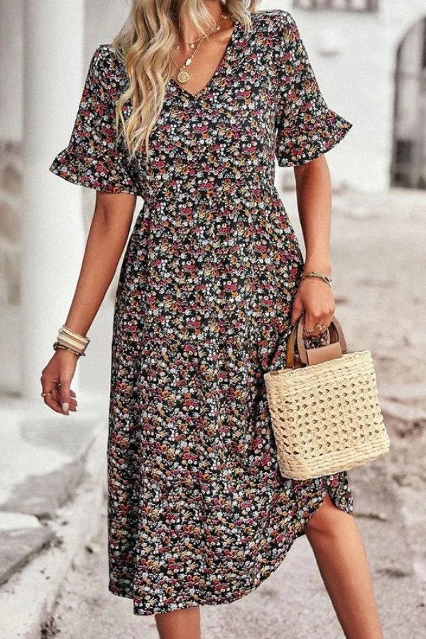 Robe d'été femme à imprimé floral, silhouette mi-longue et style chic. 0