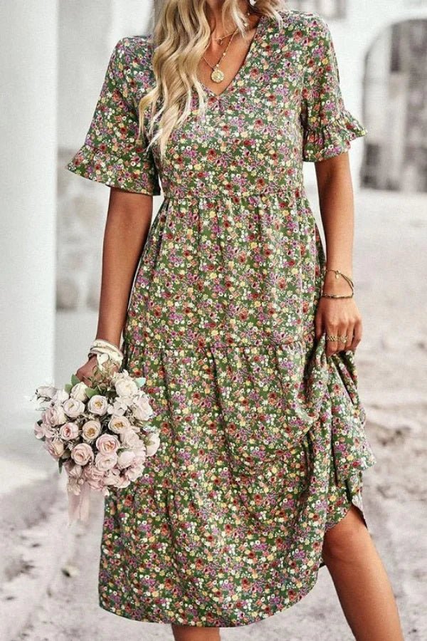 Robe d'été femme à imprimé floral, silhouette mi-longue et style chic. 1